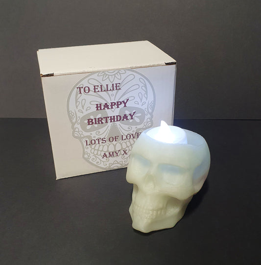 Glow in the dark skull tea light holder