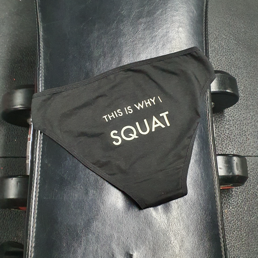 Squat knickers laying flat in a gym