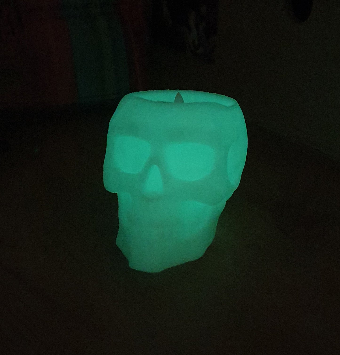 Glow in the dark skull tea light holder